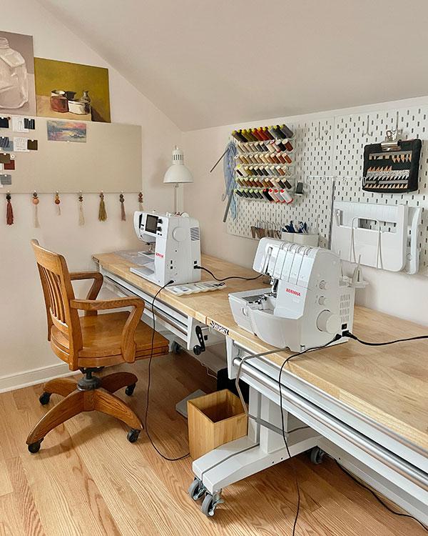 Tailors work desk. Pattern of sewing accessories and tools on
